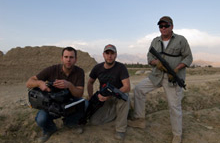 The team filming in Bagram, Afghanistan, with security
