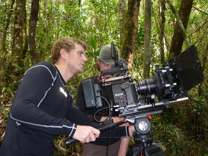 Camera and crew in woods